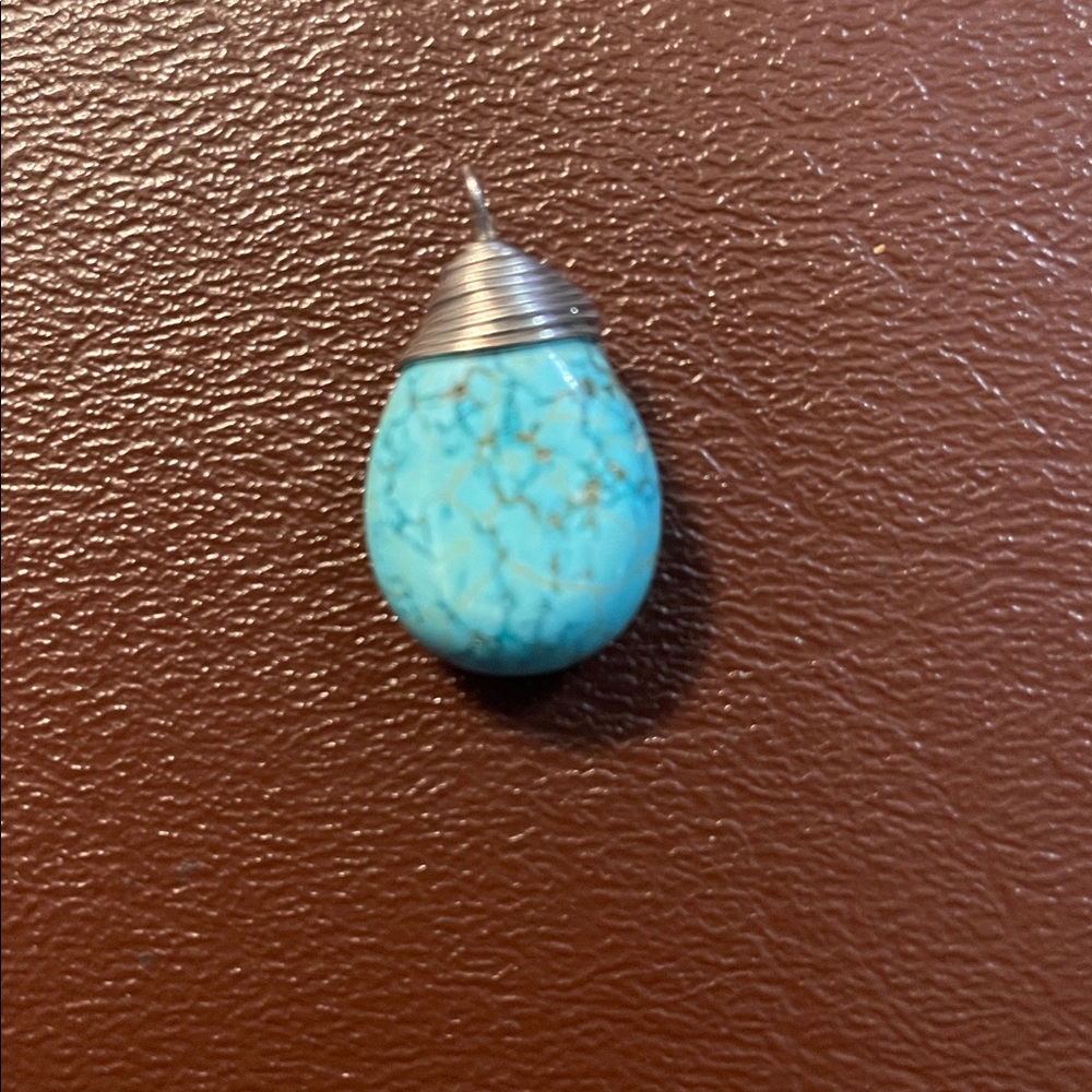 Turquoise teardrop pendant with silver wire wrap